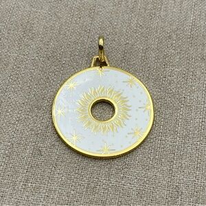 Gold tone Celtic sun star pendant